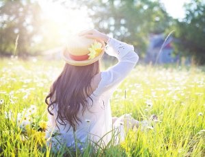 Woman sunbathes